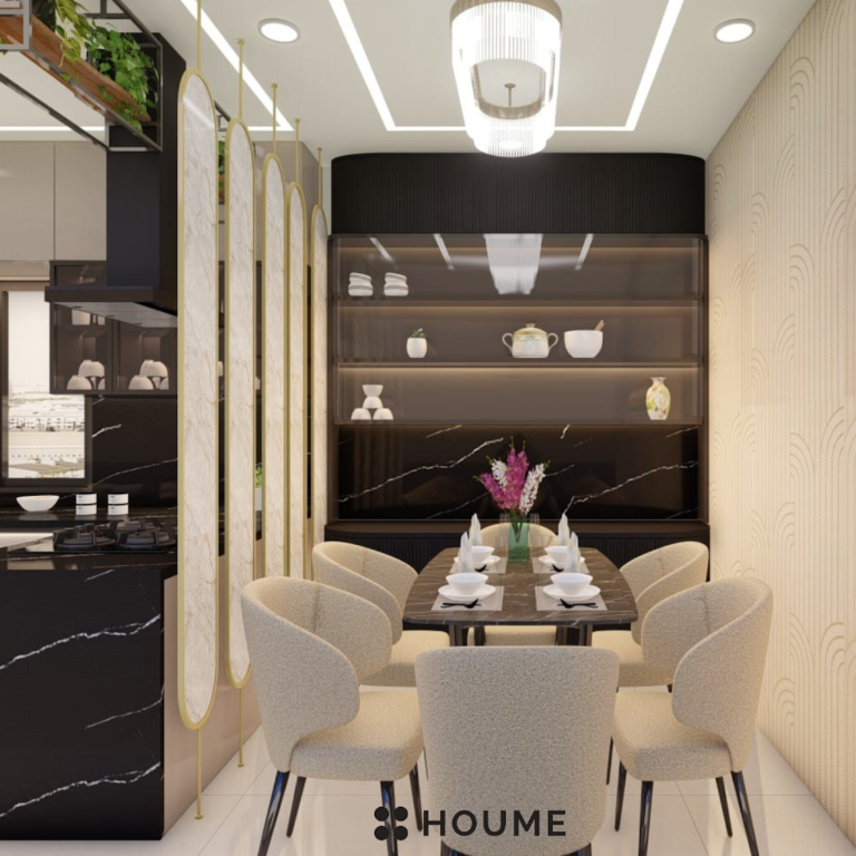 A clean and organized kitchen with a sink and window. Text overlay: Houme India - Kitchen Design Ideas D