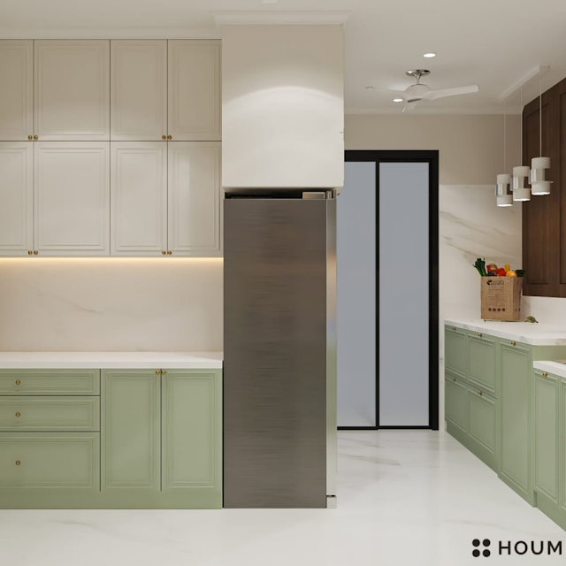 Kitchen with ample storage cabinets and a sink with a window above. Text overlay: Houme India - Kitchen Design Ideas - E