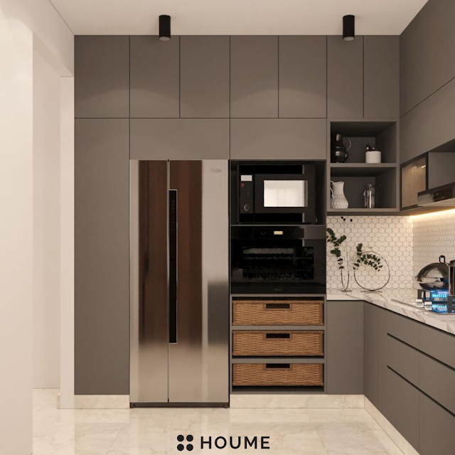 Modern kitchen with open wood shelves, butcher block breakfast bar with black metal legs and stools, stainless steel sink, and a window with a black frame overlooking a green backyard. Text overlay: Houme India - Kitchen Design Ideas. B
