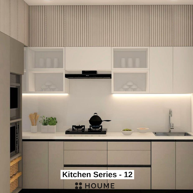 Modern kitchen with white shaker cabinets, black granite countertops, and gold cabinet pulls and knobs. Text overlay: Houme India - Kitchen Design Ideas.