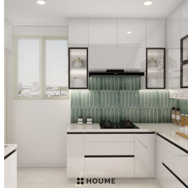 Modern kitchen with a textured brick accent wall, stainless steel appliances, open wood shelves with black metal brackets, and white quartz countertops. Text overlay: Houme India - Kitchen Design Ideas. B