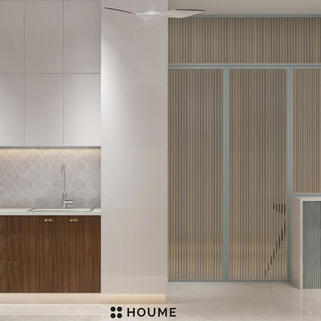 Traditional Indian kitchen with patterned tile flooring, wooden cabinets in a warm brown tone, and a vintage ceiling fan with woven blades. Text overlay: Houme India - Kitchen Design Ideas. C