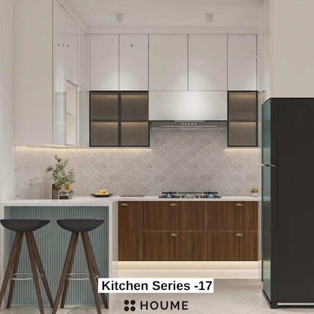 Traditional Indian kitchen with patterned tile flooring, wooden cabinets in a warm brown tone, and a vintage ceiling fan with woven blades. Text overlay: Houme India - Kitchen Design Ideas.
