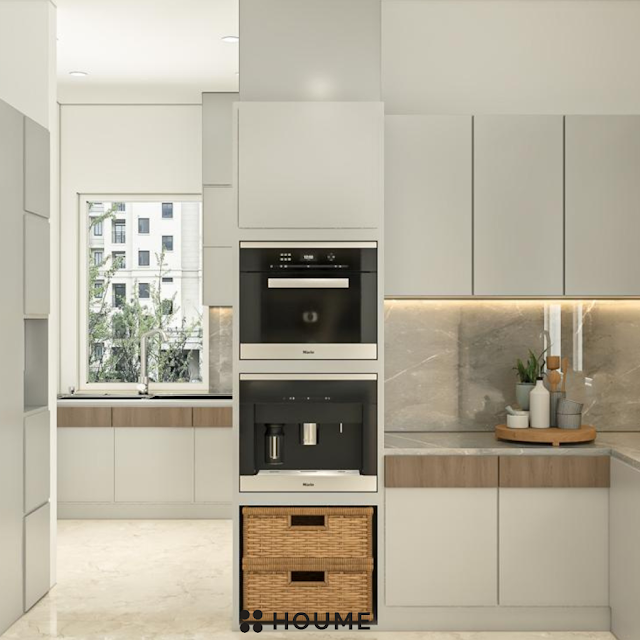 Modern kitchen with open wood shelves, stainless steel appliances, and white quartz countertops. Text overlay: Houme India - Kitchen Design Ideas. B