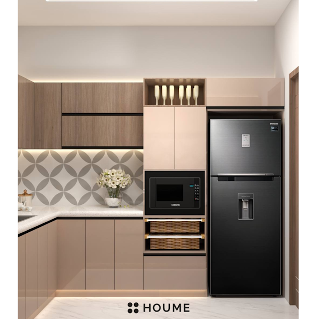 Kitchen with a stainless steel stove and a black pot on the burner. A window with a black metal frame is above the stove, and a white patterned tile backsplash can be seen behind the stove. Text overlay: Houme India - Kitchen Design Ideas. B