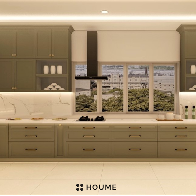 Modern kitchen with white cabinets, stainless steel appliances, and a spacious walk-in pantry featuring floor-to-ceiling glass doors. Text overlay: Houme India - Kitchen Design Ideas. B