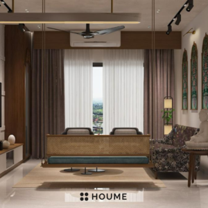 Living room with a large leaning mirror with a black metal frame, a round jute rug, and a white boucle armchair with a wooden frame. Text overlay: Houme India - Interior Design Ideas. B
