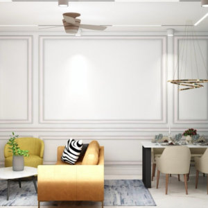 Living room with a mid-century modern olive green fabric couch, round wood coffee table with splayed legs, and a cream colored rug. Text overlay: Houme India - Interior Design Ideas. C