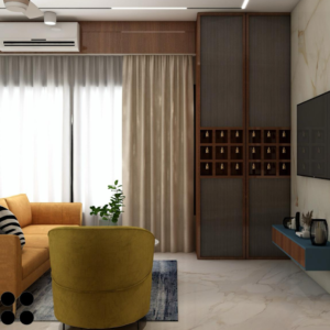 Living room with a mid-century modern olive green fabric couch, round wood coffee table with splayed legs, and a cream colored rug. Text overlay: Houme India - Interior Design Ideas. D