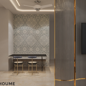 Living room featuring a large leaning mirror with a brushed gold metal frame, a round jute rug in a light natural color, and a white boucle armchair with a curved wooden frame. Text overlay: Houme India - Interior Design Ideas. E