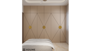 Bedroom interior featuring a tropical mural on the accent wall. The mural depicts a variety of plants and flowers, including palm trees, monstera leaves, and birds of paradise. A white bed with a woven cream blanket and pillows sits in front of the mural. Text overlay: Houme India - Interior Design Ideas. D