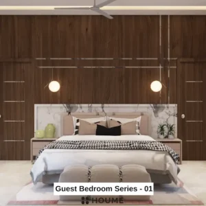 Mid-century modern bedroom interior featuring a platform bed with a walnut wood frame, a woven cream blanket and pillows, and a round wooden nightstand with a drawer. A woven jute rug covers the floor. A ceiling fan with woven blades hangs from the ceiling. The wall behind the bed is painted a light blue color. Text overlay: Houme India - Interior Design Ideas.