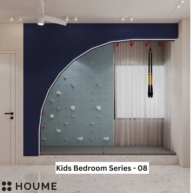 Children's bedroom interior featuring a climbing wall with colorful handholds in various shapes and sizes. The climbing wall covers one wall of the bedroom. Text overlay: Houme India - Interior Design Ideas.