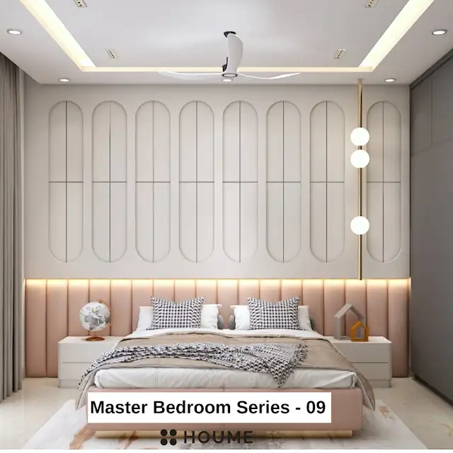 Bedroom interior featuring a wooden platform bed with a white quilt and pillows. A vintage world globe sits on a wooden nightstand beside the bed. A ceiling fan with woven blades hangs from the ceiling. Text overlay: Houme India - Interior Design Ideas.