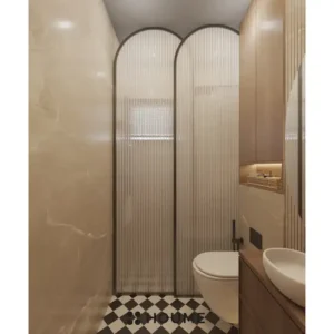 Simple, clean bathroom interior with a white toilet, pedestal sink with a chrome faucet, and a rectangular mirror with a chrome frame mounted above the sink. Text overlay: Houme India - Interior Design Ideas. C