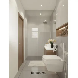 Simple bathroom interior featuring a white toilet, sink with a chrome faucet, and a rectangular mirror with a chrome frame above the sink. Text overlay: Houme India - Interior Design Ideas. C