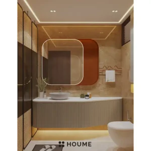 Simple bathroom interior featuring a white toilet, pedestal sink with a chrome faucet and a rectangular mirror with a chrome frame above the sink. Text overlay: Houme India - Interior Design Ideas. C