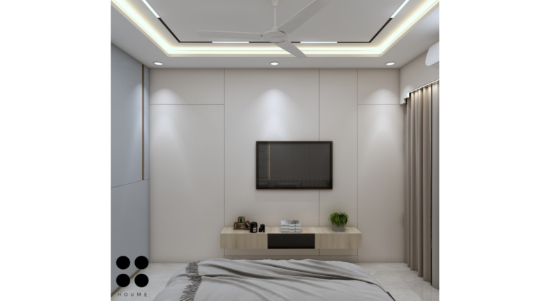 Modern master bedroom design with a textured stone accent wall, recessed lighting, and a neutral color palette. D