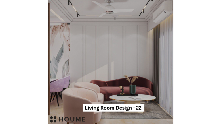 A modern living room with soft pink armchairs, a burgundy velvet sofa, white wall paneling, and a floral accent wall.