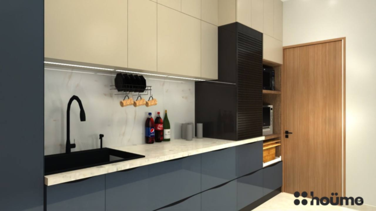 A modern kitchen design with sleek grey cabinets, a black accent wall, and built-in appliances. B