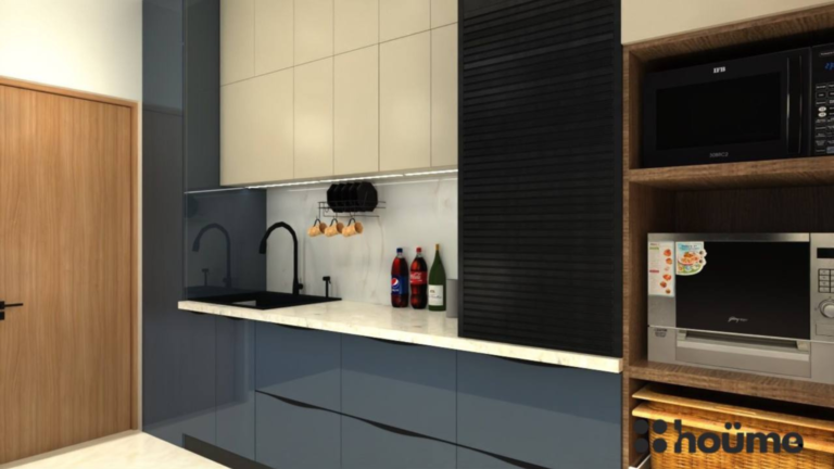 A modern kitchen design with sleek grey cabinets, a black accent wall, and built-in appliances. C