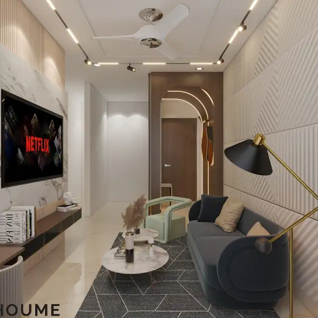 A modern living room design featuring a textured geometric wall panel, a navy blue sofa, and minimalist decor. C