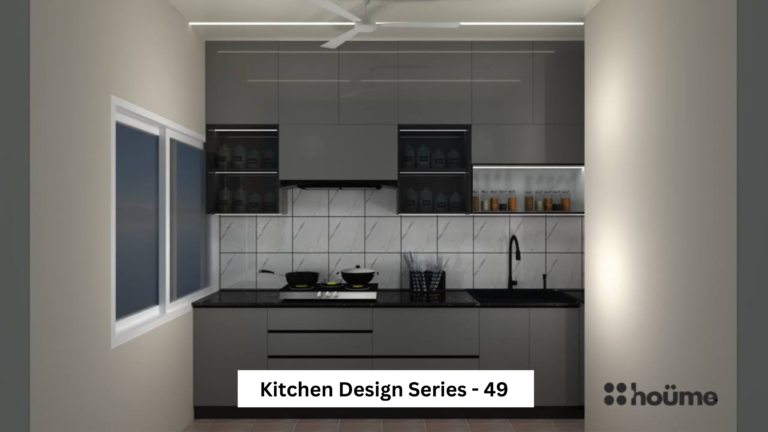 A modern grey kitchen with glossy cabinets, under-cabinet lighting, and a black countertop.