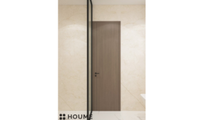 A modern washroom design with neutral toned tiles, a black framed glass shower enclosure, a floating black vanity, and recessed shelving. D