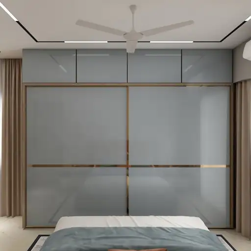 A modern and cozy bedroom with a warm color palette, featuring a cushioned bed, pendant lights, and a textured accent wall. D