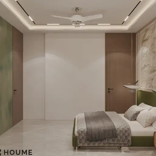 A modern bedroom design featuring a green upholstered bed, a textured stone accent wall, and pendant lighting B