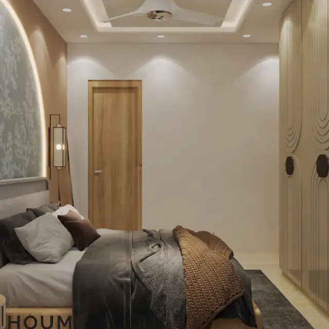 A modern bedroom with a gray upholstered bed, a floral patterned headboard, and warm accent lighting C