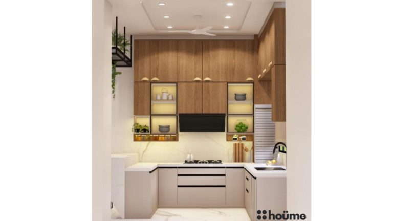 A modern U-shaped kitchen design with warm wood cabinetry, a white countertop, and integrated lighting. B