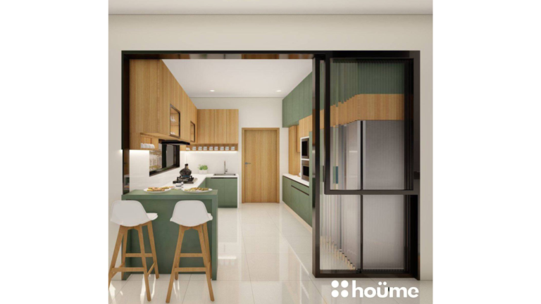 A modern L-shaped kitchen with light wood upper cabinets, sage green lower cabinets, and a breakfast bar. E
