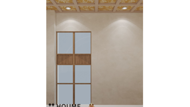 A modern Pooja room design with a white marble backdrop, a golden statue of Lord Krishna, and warm lighting. D