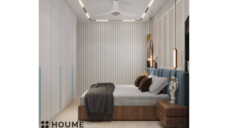 A modern master bedroom with a blue headboard, featuring artwork of cranes on the wall behind the bed B