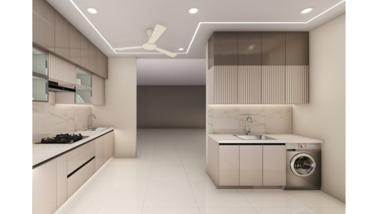 A modern L-shaped kitchen with beige cabinets, a marble backsplash, and integrated appliances. C