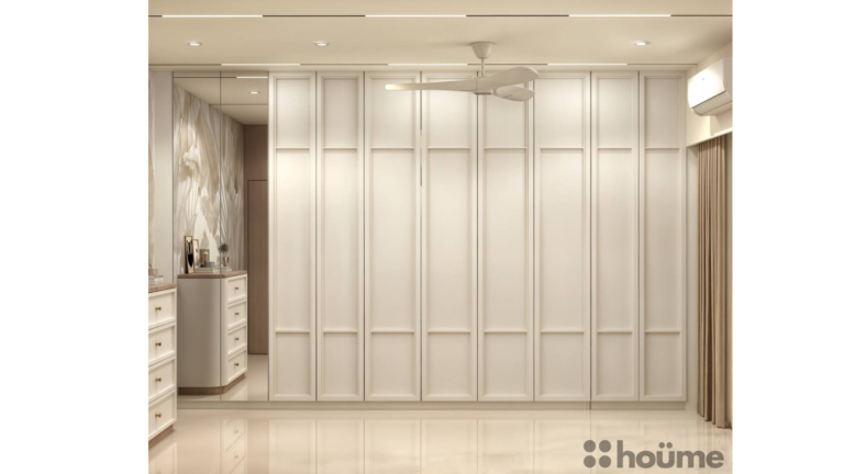 A modern master bedroom with a unique headboard design featuring built-in shelves and lighting. E