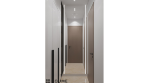 A modern walk-in closet with white and wood-toned cabinetry and integrated lighting. B