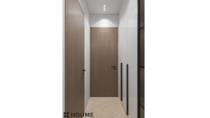 A modern walk-in closet with white and wood-toned cabinetry and integrated lighting. C