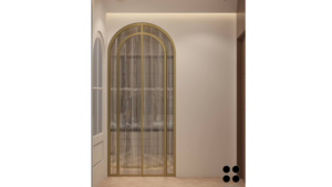 A luxurious walk-in closet with arched glass doors, a central island, and a built-in bench. D
