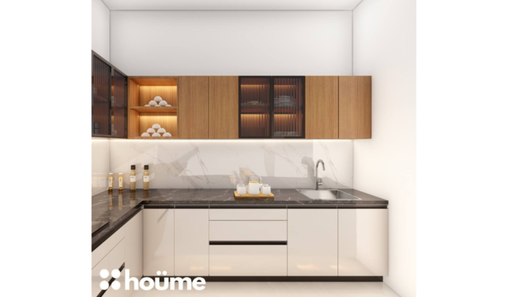 A modern kitchen design with white and wood-toned cabinets, black countertops, and stainless steel appliances. A tall, glass-fronted cabinet provides additional storage. B