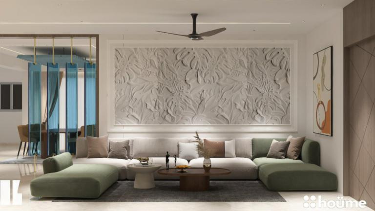 A contemporary living room design featuring a stylish blue glass partition separating the dining area, as showcased on Houme India's website. B
