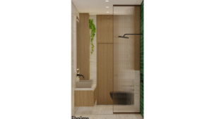 A minimalist washroom design featuring a wood-framed mirror, a floating vanity, and a green accent wall with a built-in shelf. C