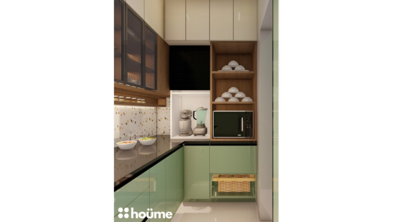 A contemporary L-shaped kitchen with green lower cabinets, wood and glass upper cabinets, and a speckled backsplash. C