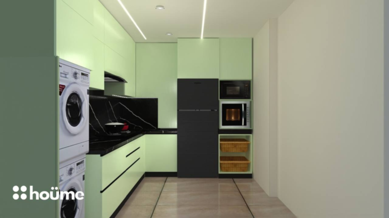 A contemporary kitchen featuring green cabinets, black countertops, and integrated appliances, as showcased on Houme India's website. C