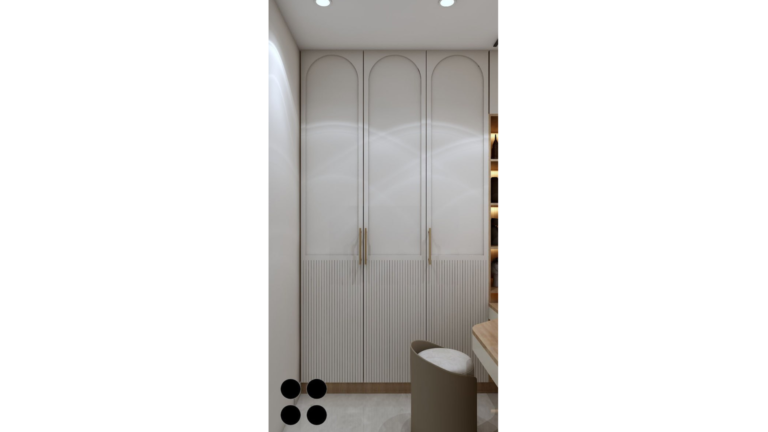 A contemporary walk-in closet featuring a built-in vanity with a sink, ample storage, and modern lighting. B