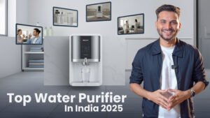 Ar. Sourabh Jain is in a black jacket smiling and gesturing, next to a modern silver and white water purifier dispensing water into a glass. Smaller inset images show various water purifiers and people interacting with them in home settings. The title reads "Top Water Purifier In India 2025.