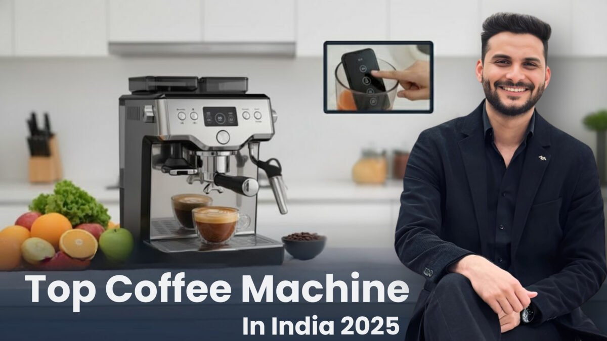 A sleek, professional-grade espresso machine in silver and black sits on a modern kitchen counter, brewing two cups of rich coffee. Alongside are fresh coffee beans in a small bowl. A confident man (Sourabh) in a black suit gestures towards the machine, with an inset image showing a hand operating the machine's controls or a smart app. The title "Top Coffee Machine In India 2025" is displayed at the bottom, against a blurred, contemporary kitchen background.