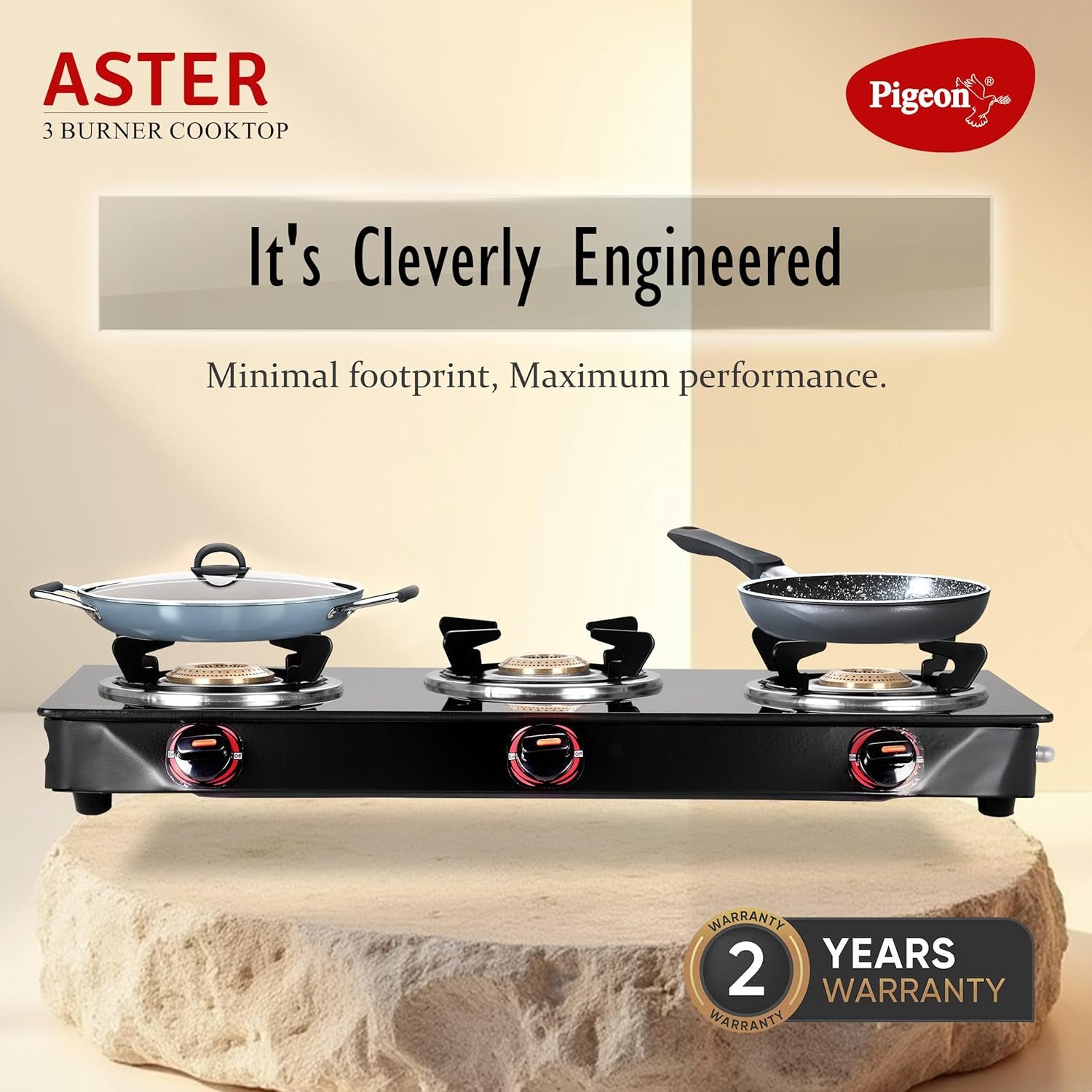 Close-up of the brass burners on the Pigeon Aster stove.