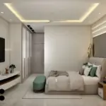 Sage green bed and seating — bedroom design, view 2